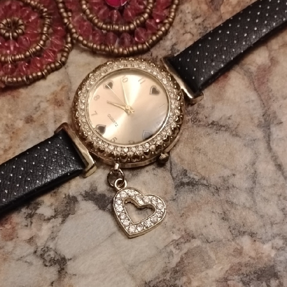 Elegant Gold and Black Women's Watch with Heart Charm